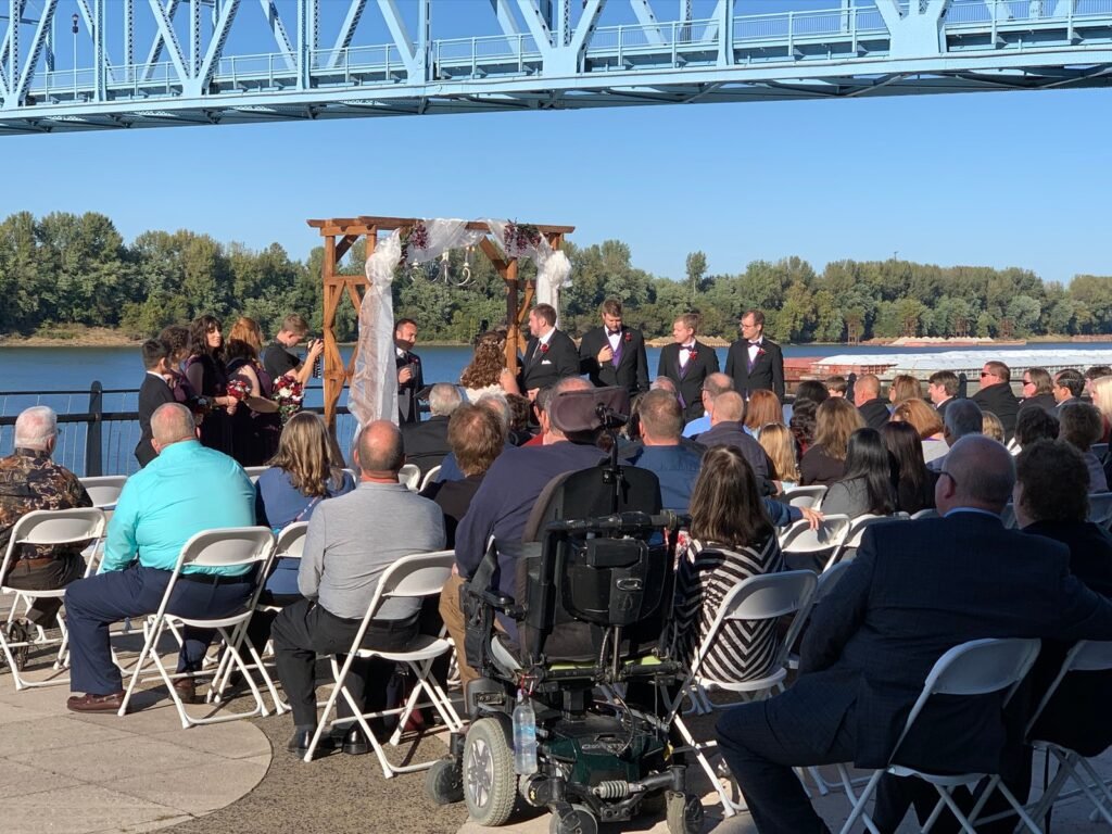 Outdoor wedding ceremony by the river
