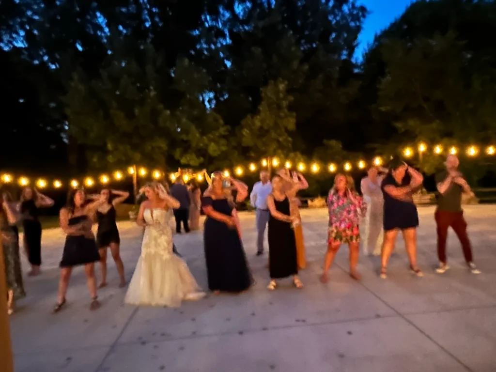Wedding reception dancing under string lights Madisonville KY - Crunk DJ