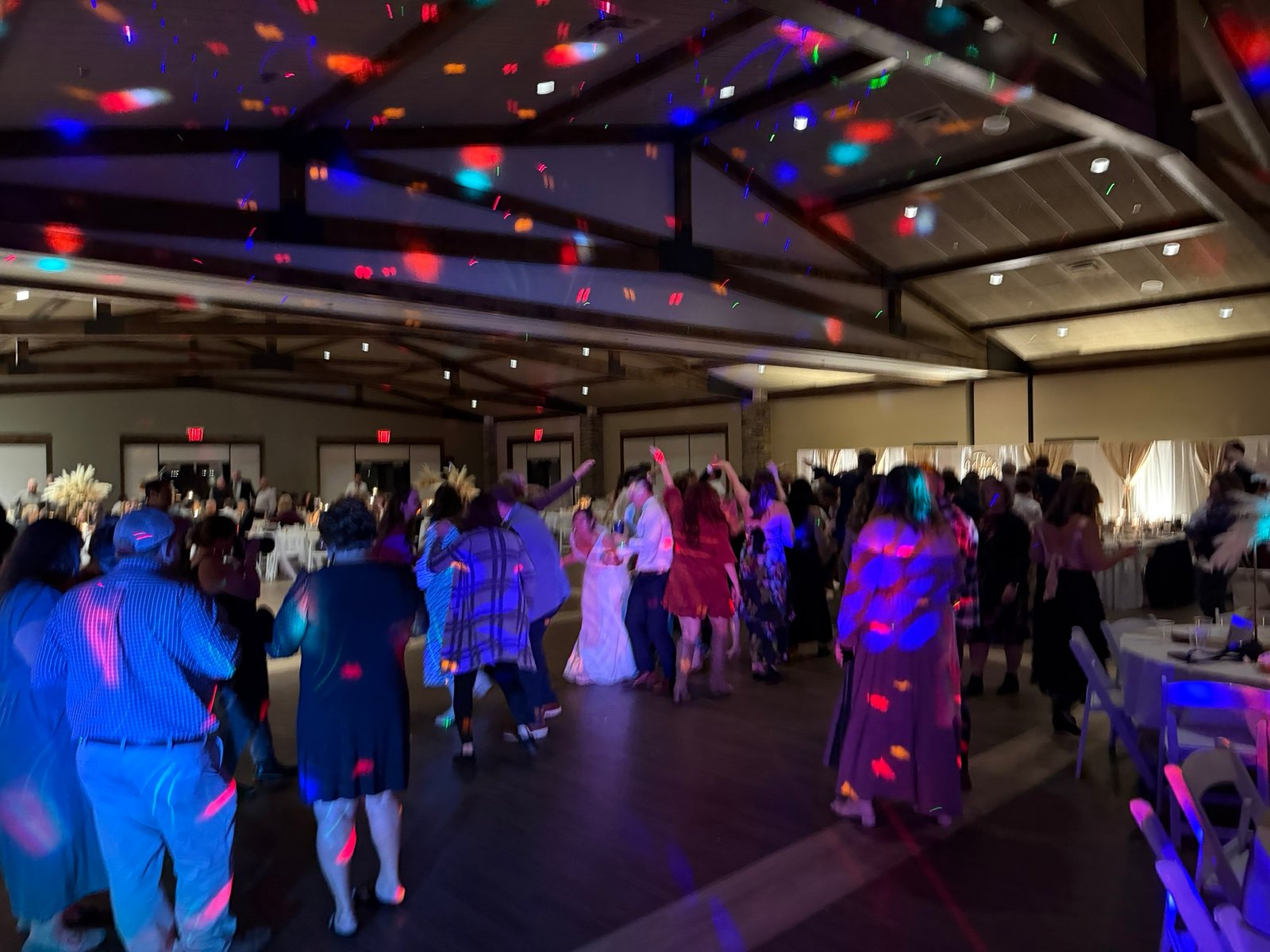 Crunk DJ uplighting at Evansville Indiana wedding venue ceiling