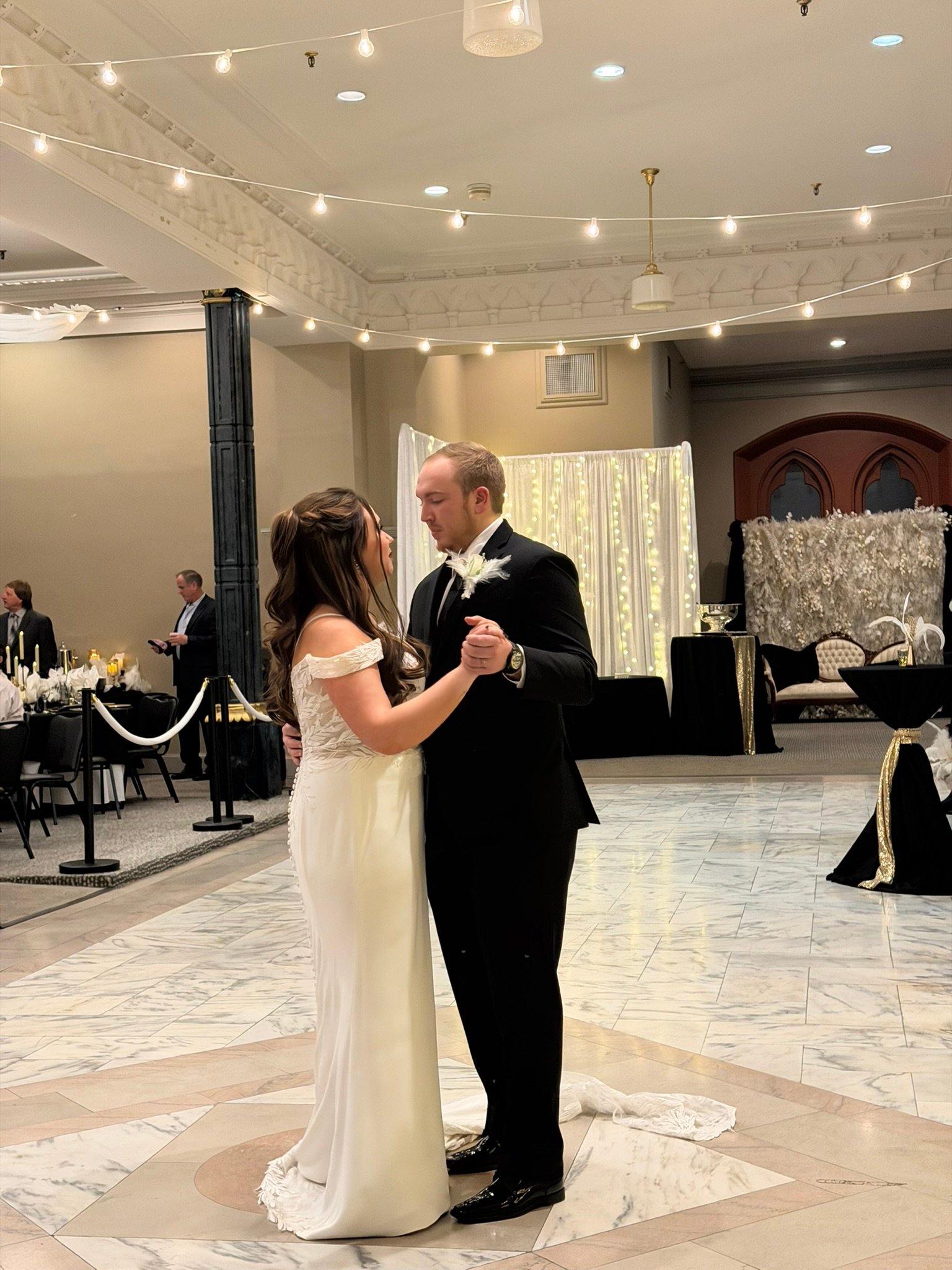 Crunk DJ reception venue with string lights at Evansville wedding